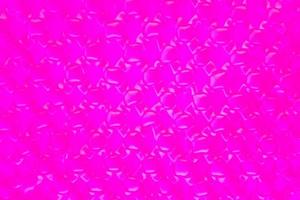 Purple pattern blurred background. Image close up out of focus from the cloths. Art design pattern. Glitter abstract with an elegant bright gradient design. photo