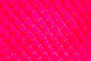 Purple pattern blurred background. Image close up out of focus from the cloths. Art design pattern. Glitter abstract with an elegant bright gradient design. photo