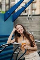 stylish young girl with drink photo