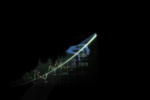 estadísticas de escritura a mano que aumentan la flecha con el gráfico del mercado de valores para la inversión empresarial y el concepto de economía de ganancias de granos de crecimiento. foto