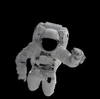 Space suits isolated on black background with clipping path. Elements of this image furnished by NASA. photo