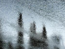 Abstract shiny background. Wet surface with reflections. photo