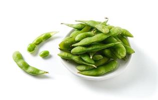 green soybeans on white background photo