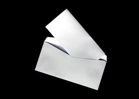 blank of letter paper and white envelope photo