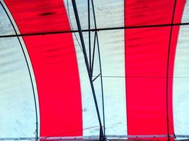 The old red and white canvas roof of the temporary building photo