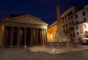 Illuminated Pantheon in Rome by night. One of the most famous historic landmark in Italy. photo