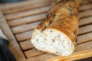 baguette pumpkin seeds french fresh bread fresh portion healthy meal food photo