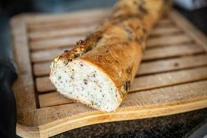 baguette pumpkin seeds french fresh bread fresh portion healthy meal food photo