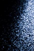 Dark blue abstract background with bokeh. Colorful twinkling lights bokeh light background. photo