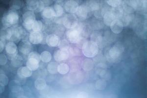 Dark blue abstract background with bokeh. Colorful twinkling lights bokeh light background. photo