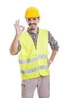 Content male contractor showing OK gesture photo