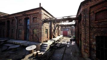 Old abandoned industrial buildings at factory photo