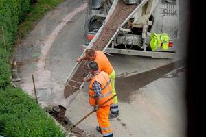 Zorzone Bergamo Italy 23 September 2020 Workers at work to bury the cables of the ultra-fast network photo