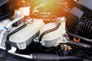 coolant car engine detail - close up of machine new engine motor checking and cleaning for deliver customers in the car service photo