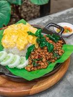 Stir-Fried Minced Pork with holy basil and chili. photo