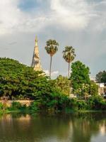 The pagoda of Wat Chedi liam or Ku Kham Temple with ping river, an ancient site in Wiang Kum Kam, The ruins of the ancient capital of the Lanna Kingdom, Chiang mai, Thailand. photo