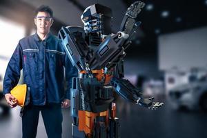 hombre asiático con robot comunidad metaverso para vr avatar juego de realidad realidad virtual de personas servicio de inspector conectar tecnología inspector mecánico mantenimiento robot en la fábrica foto