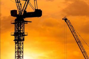 construction cranes and building silhouettes photo