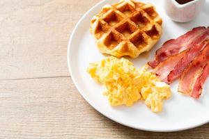 scrambled egg with bacon and waffle photo