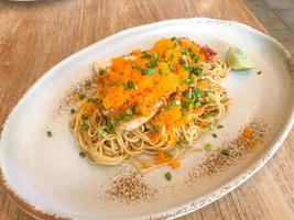 stir-fried angle hair spaghetti with seafood and shrimp egg photo