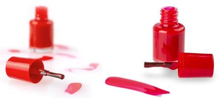 The close up of  a nail polish bottle and drop photo