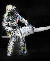 Firefighter fighting For A Fire Attack on black background photo