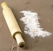 white flour with a rolling pin photo