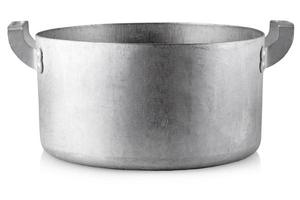 Open stainless steel cooking pot over white background photo