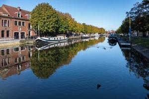 BRUGES, BELGIUM, 2015. View down a canal in Bruges West Flanders Belgium