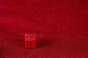 Red background image and gift box Valentine's Day concept photo