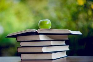 Picture of books and educational equipment placed on the table Educational concept with copy space photo