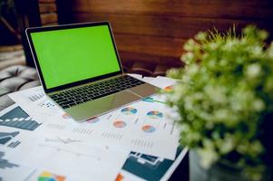 The desk and graph are placed on the business desk. Business concept With copy space photo