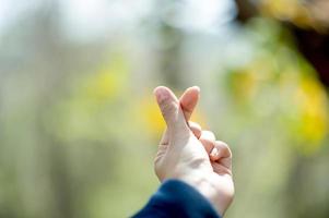 A hand that shows love to lovers on the day of love Love day With copy space photo