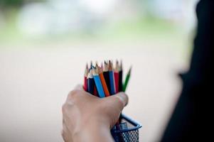 Hand and pencil pictures, green background color Education concept With copy space photo