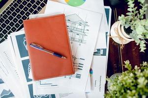 The desk and graph are placed on the business desk. Business concept With copy space photo