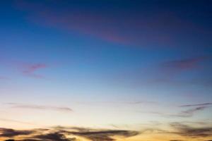 Blue sky background with beautiful clouds photo