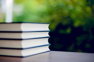 Picture of books and educational equipment placed on the table Educational concept with copy space photo