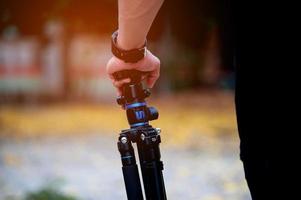 Hand photograph and photographic equipment of the photographer Concept photographer photo