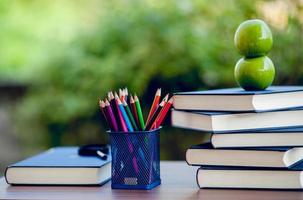 Picture of books and educational equipment placed on the table Educational concept with copy space photo