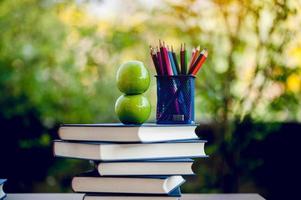 Picture of books and educational equipment placed on the table Educational concept with copy space photo