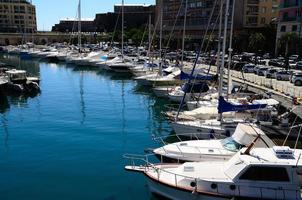 boats and cars in port of Savona photo