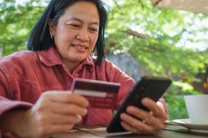 woman use mobile app shopping online photo