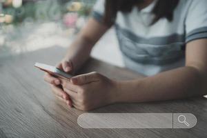 Searching engine with blank search bar, Search engine optimization. Searching Browsing Internet Data Information Networking Concept, Human hand use mobile phone to search the internet, SEO photo