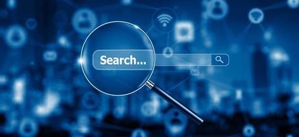 Search Engine Optimisation - SEO - with Magnifying glass on Network and Social Media. photo