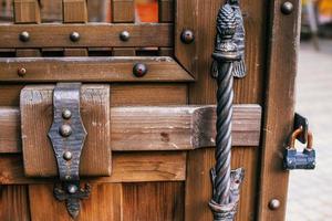 forged parts on old wooden surfaces photo