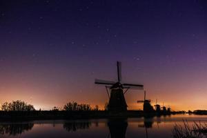 Starry sky over Dutch mills.