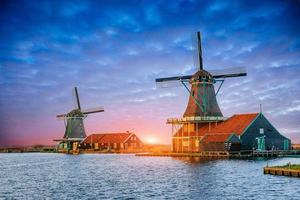 Cumulus clouds on sunset over dutch windmills in Rotterdam. Neth photo