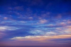 colorful sky with sun background in mountains photo