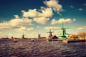 Traditional Dutch windmills from the channel Rotterdam. Holland photo