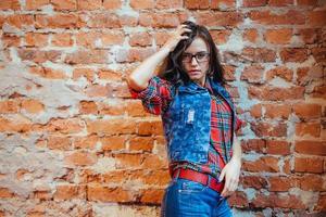 Surprised girl in jeans clothes and a red shirt in the box.Art p photo